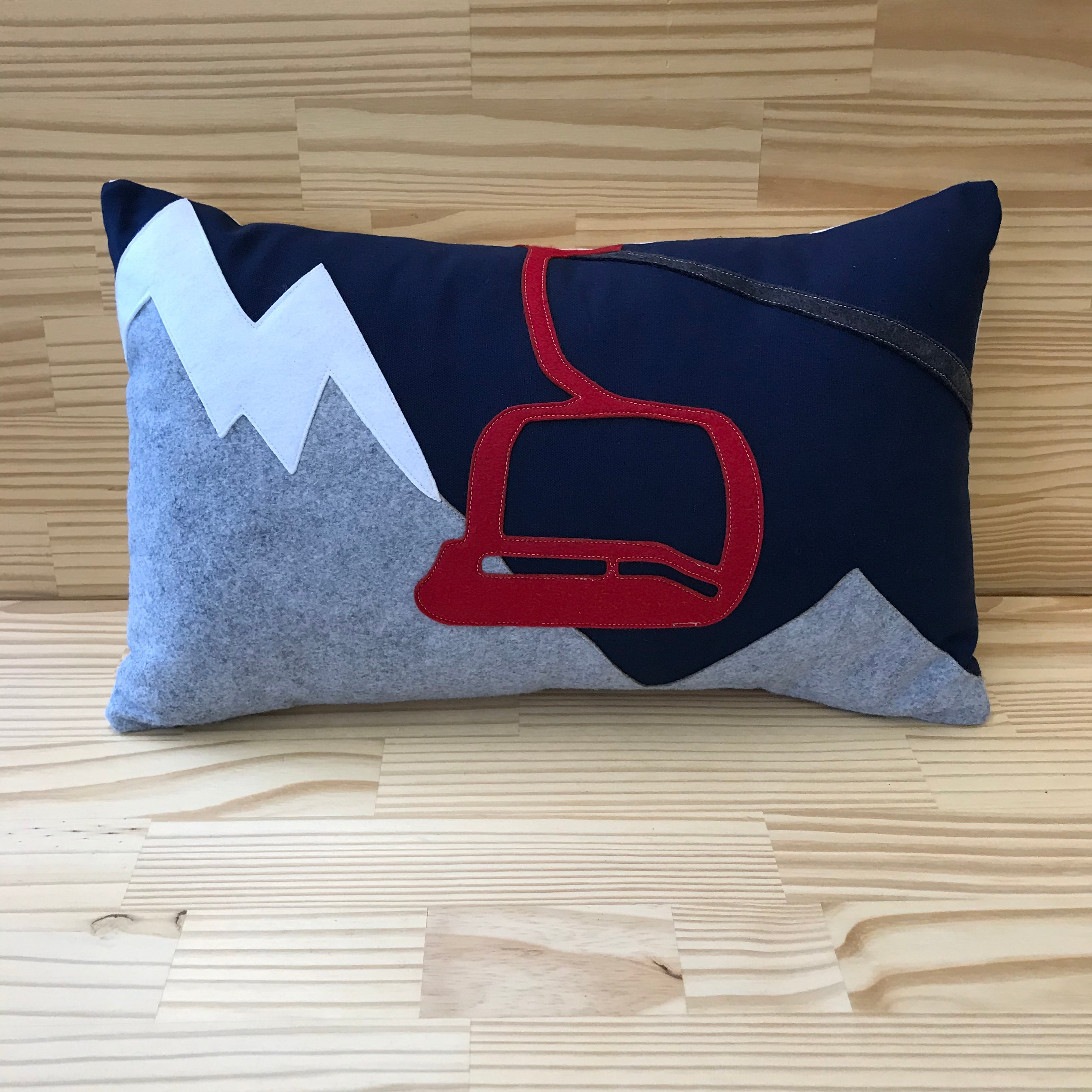 14x21" red chairlift on mountains lumbar pillow, navy